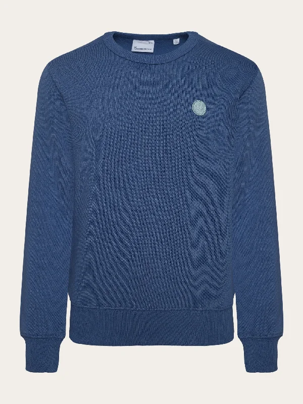 Flash sale: Men’s clothing essentials at irresistible prices! Badge crew neck sweat - Moonlight Blue Flash sale: Men’s clothing essentials at irresistible prices! Badge crew neck sweat - Moonlight Blue
