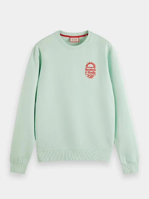Men’s wardrobe essentials now at unbeatable prices.  Chest artwork sweatshirt
