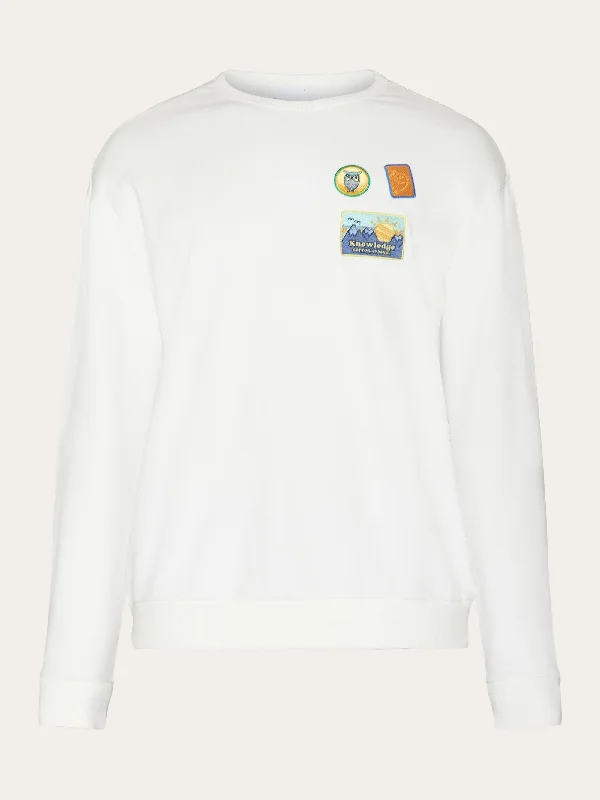 Exclusive discounts on all types of clothing – Shop now! Loose fit crew sweat with badge embr - GOTS/Vegan - Egret Exclusive discounts on all types of clothing – Shop now! Loose fit crew sweat with badge embr - GOTS/Vegan - Egret