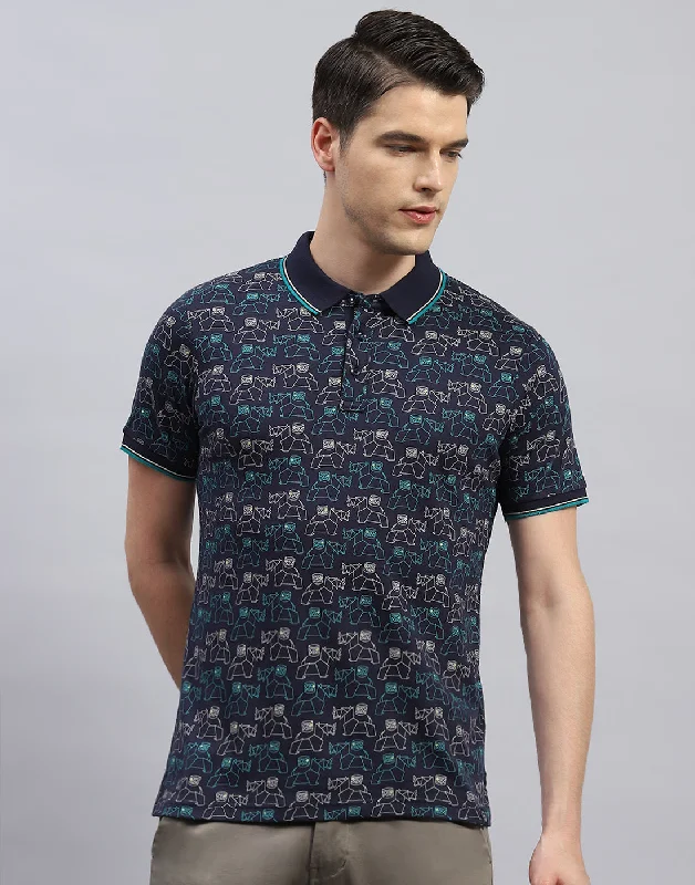 Discover new arrivals in clothing – Affordable styles for every occasion.  Men Navy Blue Printed Polo Collar Half Sleeve T-Shirt