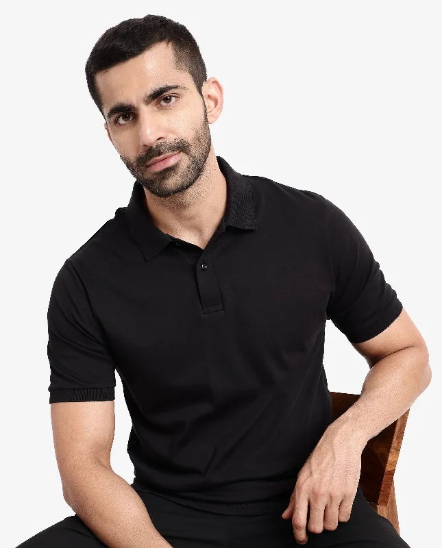 Shop the look you love at prices you’ll love even more!  Rare Rabbit Men Row-1 Black Cotton Fabric Short Sleeve Button Closure Regular Fit Solid Polo T-Shirt