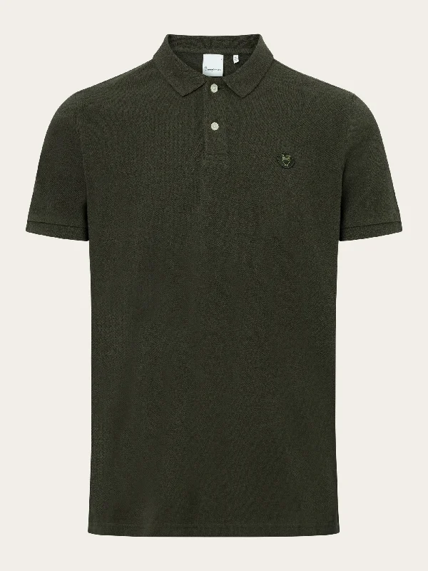 Upgrade your wardrobe with stylish men's apparel – now on sale! Basic badge polo - Green melange Upgrade your wardrobe with stylish men's apparel – now on sale! Basic badge polo - Green melange